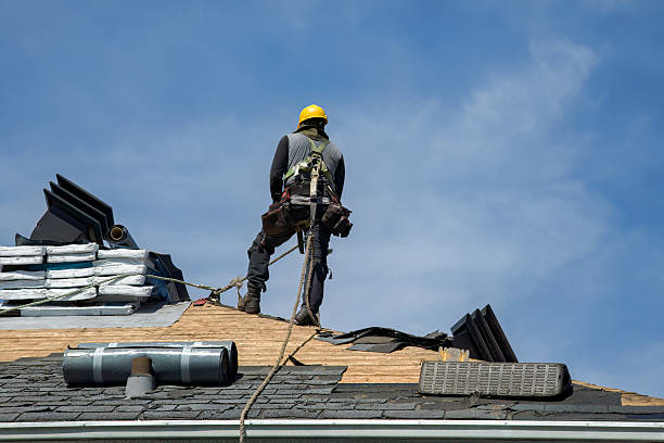 Professional Roof Replacement technician working in Ronan, MT